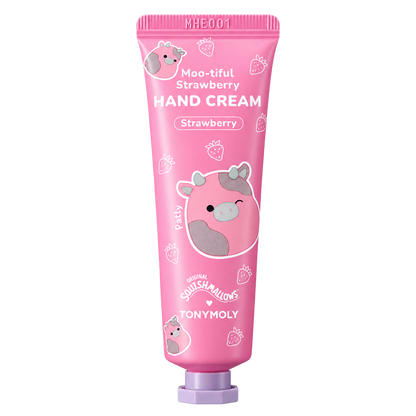 A pink squeeze tube of Tony Moly 'Moo-tiful Strawberry HAND CREAM' featuring a cute cartoon cow illustration and white text, set against a plain white background.